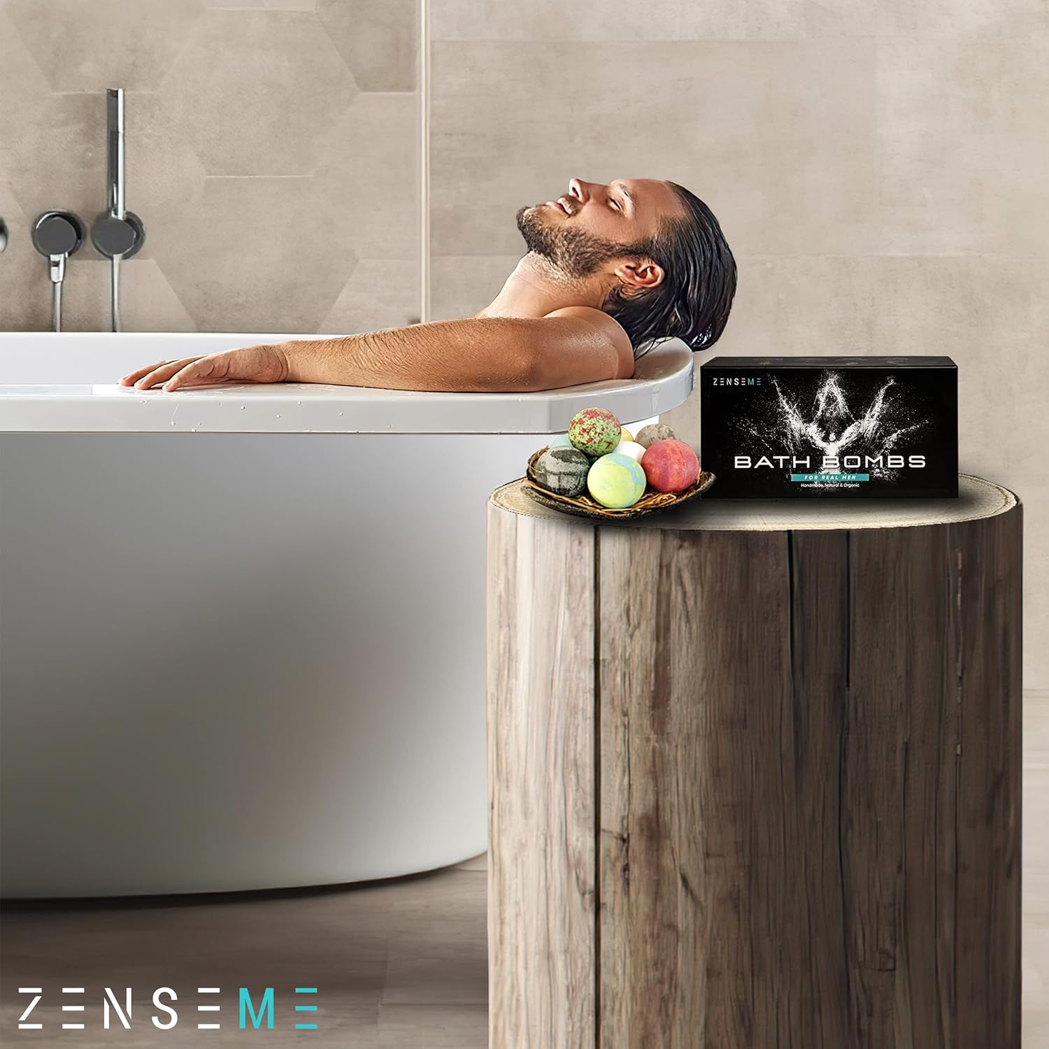 Man relaxing in a bathtub with bath bombs on a wooden stand.